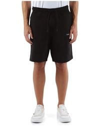 Calvin Klein - Shorts in cotone sportivo con stampa logo - Lyst