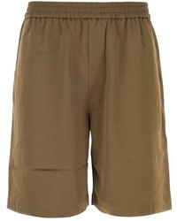 Nanushka - Satin bermuda shorts in khaki - Lyst