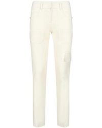 Genny - Trousers > slim-fit trousers - Lyst