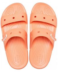 15 % de descuento ClassicAnimalRemixSlde Crocs™ de color Negro sandalias y chanclas de Chanclas de dedo y de pala Mujer Zapatos de Zapatos planos 