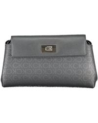 Calvin Klein - Borsa a tracolla nera con chiusura a scatto - Lyst