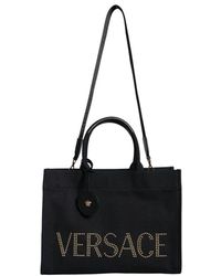 Versace - Canvas leder crossbody tote tasche - Lyst