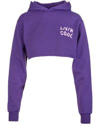 LIVINCOOL - Hoodies & Sweatvesten ,Paars ,Paarse Orchidee Crop Hoodie Artwork - Lyst
