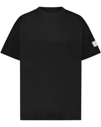 flâneur - Schwarzes baumwoll-t-shirt mit patch flâneur - Lyst