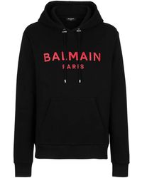 Balmain - Felpa in cotone con stampa del logo di parigi - Lyst