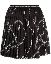 Versace - Falda corta negra para mujeres - colección aw 23 - Lyst