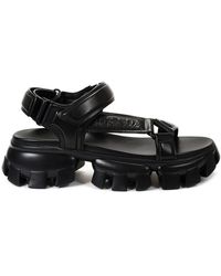 Prada - Luxuriöse schwarze leder-logo-sandalen - Lyst