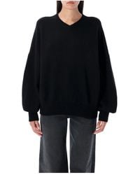 KHAITE - Zwarte Gebreide V-Hals Trui Aw25 - Lyst