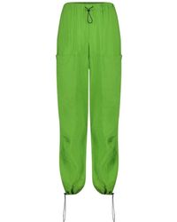 Jane Lushka - Pantalones verdes de pierna ancha en cupro - Lyst
