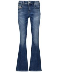 DIESEL - Flared Jeans - Lyst
