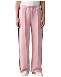 Guess - Broeken ,Roze ,Polyester Talitha Trainingsbroeken - Lyst