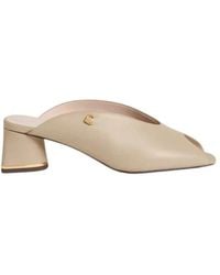 Coccinelle - Heeled Mules - Lyst