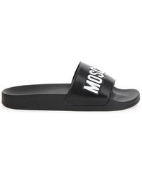 Moschino - Schoenen ,Zwart ,Zwarte Logo Rubber Zwembadschoenen - Lyst
