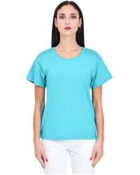 Moschino - Aqua grünes logo t-shirt - Lyst