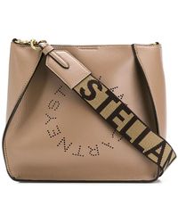 Stella McCartney - Logo-schultertasche mit perforiertem detail - Lyst