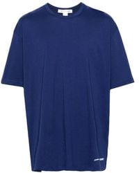 Comme des Garçons - T-shirt in cotone con stampa logo in blu - Lyst