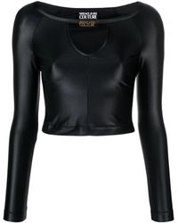 Versace - Top negro con lycra light shiny - Lyst