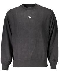 Calvin Klein - Schwarzer sweatshirt mit druck und langen ärmeln - Lyst