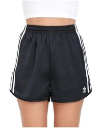 adidas Originals - Schwarze satin sprint shorts - Lyst