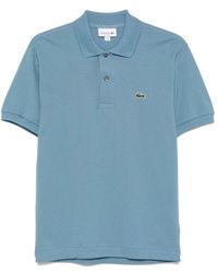 Lacoste - Blau polo shirt mit logo patch - Lyst