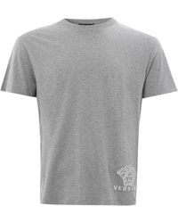 Versace - T-shirt in grigio melange con logo a contrasto bianco - Lyst