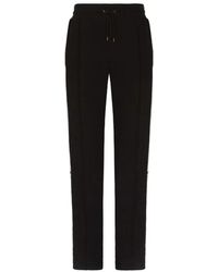 Dolce & Gabbana - Pantaloni in cotone con stampa logo bianco e nero - Lyst