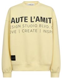 Haute L'Amitié - Maxi Split Logo Sweatshirt - Lyst