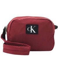 Calvin Klein - Rote crossbody taschen - Lyst