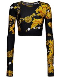 Versace - Top viola a maniche lunghe con stampa chain couture - Lyst
