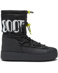 Moon Boot - Schwarze flache schuhe mit pvc-details - Lyst