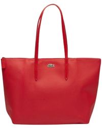 Lacoste - Einfarbige tasche mit logo - Lyst