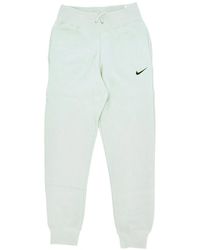 Nike - Pantalones De Chandal De Forro Polar Para Mujer Ropa Deportiva Joggers De Forro Polar De Talle Alto Plata Claro/Negro - Lyst