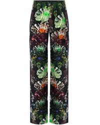 Stine Goya - Pantalones multicolor con estampado floral elásticos - Lyst