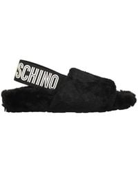 Love Moschino - Flache sandalen mit kunstfell und logodetail - Lyst