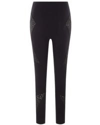 Versace - Schwarze technische leggings mit -details - Lyst