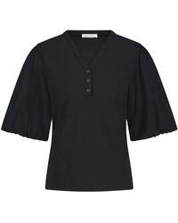 Jane Lushka - Schicke schwarze bluse mit puffärmeln - Lyst