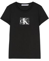 Calvin Klein - Camisetas y polos negros de calvin klein - Lyst