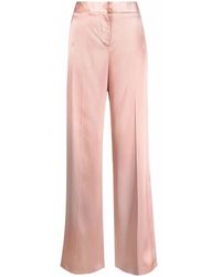 Alexander McQueen - Pantalones de seda con efecto satinado oro rosa y pierna ancha - Lyst