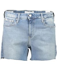 Calvin Klein - Shorts in jeans di cotone blu chiaro con logo - Lyst
