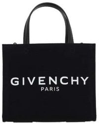 Givenchy - Schwarze canvas-tote-tasche mit lederbesatz und logo-print - Lyst