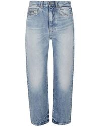 Versace - Studded Jeans - Lyst