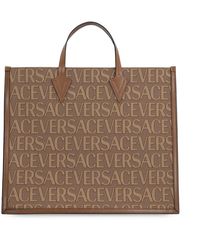 Versace - Canvas- und leder-einkaufstasche - Lyst