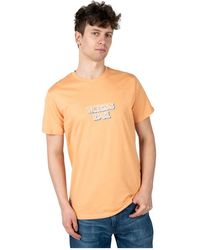 Guess - Tops ,Oranje ,Katoen Klassiek T-Shirt Met Ronde Hals - Lyst