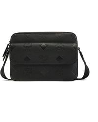 MCM - Aren Messenger-Tasche Aus Leder Mit Maxi-Monogramm - Lyst