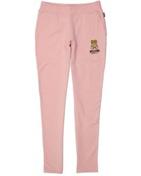 Moschino - Pantaloni da ginnastica rosa con logo per donne - Lyst