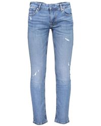 Guess - Gewaschene skinny jeans mit logo-detailing - Lyst