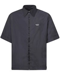 Givenchy - Schwarzes Poloshirt Klassischer Reißverschluss Stil - Lyst