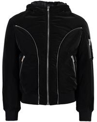 Versace - Jassen ,Zwart ,Nylon Gewatteerde Nylon Jas Met Decoratieve Ritsen - Lyst