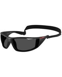 Prada - Sonnenbrille Linea Rossa Ps A04S - Lyst