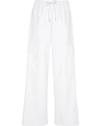 Rains - Wide trousers - Lyst